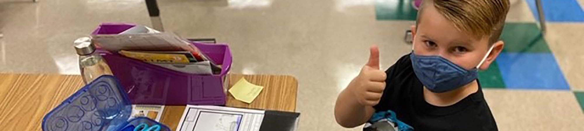 Student with school supplies